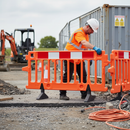 Premium Stackable Plastic Pedestrian Barrier - High-Visibility Orange for Event Safety and Traffic Control