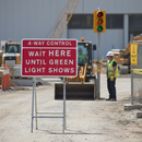 Premium 4-Way Control Wait Here Until Green Light Shows Traffic Sign 1050x750mm for Temporary Traffic Management