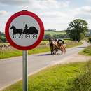 Professional Horse-Drawn Vehicles Prohibited Post Mount Sign with Hazard Awareness for Safe Road Use