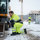 Premium Hi-Vis Yellow/Black Winter Trousers with Waterproof Fabric, Warm-Lined Design, and Adjustable Features for Optimal Comfort and Safety