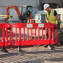 Premium Heavy Duty Injection Moulded Safety Barrier in Red with Ultra Strong Couplers and Drainage Design for Versatile Use