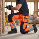 Premium High Visibility Softshell Craftsman Trousers with Holster Pockets for Durability and Comfort in Rough Weather Conditions