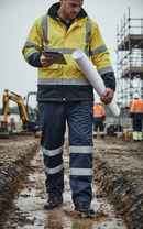 Premium Heavy Duty Overtrousers with Breathable Coating, Reflective Tape, and Cargo Pockets for Enhanced Protection and Comfort