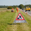Professional Heavy Duty Grass Cutting Roll-Up Sign with PVC Face and Galvanized Steel Frame for Landscapers and Grounds Maintenance