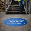Staircase Must Be Kept Clear Floor Graphic Safety Sign – 400mm Diameter – Polycarbonate – Industrial Use