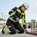 Premium Women's Hi-Vis Trousers with 4-Way Stretch, Holster Pockets, and Ventilation for Comfort and Visibility