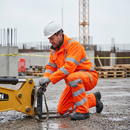 High-Performance Waterproof Overtrousers in Hi Vis Orange with Reflective Tape and Ankle Gussets for Enhanced Visibility and Comfort