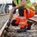 Premium Hi-Vis Orange Combat Trousers with 91% Recycled Material, Knee Pad Slots, and Six Pockets for Enhanced Functionality
