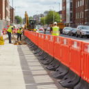 Heavy Duty Plastic Construction Barrier with Weighted Base for Enhanced Stability and Safety in Road Works
