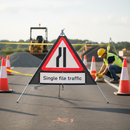 Premium Roll-Up Road Narrows Left Sign with Durable PVC Face and Galvanized Steel Frame for Effective Traffic Management