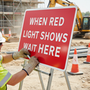 Professional Traffic Control Sign - When Red Light Shows Wait Here, 1050x750mm for Roadworks Safety