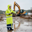 High-Performance Hi-Vis Yellow/Navy Blue Raincoat with Windproof and Waterproof Features, Adjustable Cap and Sleeve Closure