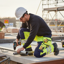 Premium Hi-Vis Yellow/Navy Blue Softshell Trousers with Holster Pockets and CORDURA® Reinforcement for Harsh Weather Protection
