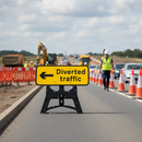 Premium Diverted Traffic Arrow Left Sign 1050x450mm with RA1 Reflective Face and Durable Stand
