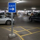 Premium Post Mounted Exit Sign with Arrow - R2 Grade Reflective Material for High Visibility in Car Parks and Structures