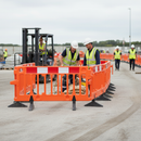 Premium Stackable Plastic Pedestrian Barrier - High-Visibility Orange for Event Safety and Traffic Control