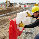 Premium Slimline Water-Filled Barrier with Optional Mesh Top for Enhanced Height and Durability in Outdoor Use