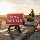 Premium Slow Wet Tar Road Sign 1050mm x 750mm with Reflective Face and High-Quality Stand for Traffic Safety
