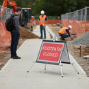 Premium Roll-Up Footpath Closed Sign - Durable PVC Face, Galvanized Steel Frame, Lightweight and Portable Design for Easy Transport