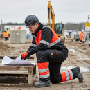 Premium High-Visibility Winter Trousers with Water-Repellent Material and Spacious Pockets for Enhanced Comfort and Durability