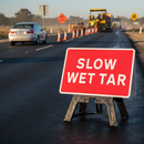 Premium Slow Wet Tar Road Sign 1050mm x 750mm with Reflective Face and High-Quality Stand for Traffic Safety