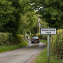 Premium Single Track Road Supplementary Plate for Traffic Control with Adjustable Text Height and Compliance with TSRGD Guidelines