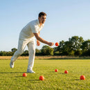 Cricket wind balls in high-visibility orange and pink for training