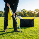Gaelic football corner flags in orange and yellow with PVC poles