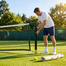 Professional tennis net and posts setup in green