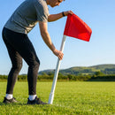 Corner flag poles with ground sleeves for sports pitches