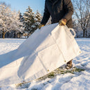 Winter weather tarpaulin protecting a driveway