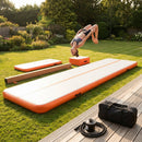 Inflatable gymnastics mat in orange and grey designed for home and gym use - product detail