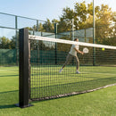 Heavy-duty padel tennis posts in black, ideal for competitive courts
