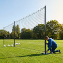 Pitch divider net system with galvanised steel posts and tensioned net