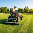 Tractor mounted drag brush for sports field maintenance