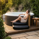 Inflatable spa booster seat for hot tubs