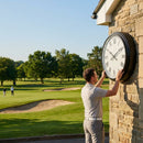 Customisable outdoor clock with black frame for golf clubhouses