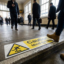 Caution Mind The Step Floor Graphic – 300mm x 100mm – Polycarbonate – Industrial Use