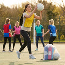 Reversible netball bibs in various colours and sizes, perfect for sports clubs