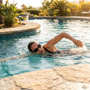 Swimming goggles available in black, grey, and white with anti-fog lenses