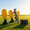 High-visibility American football training dummies in yellow PVC