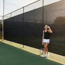 Green Tennis Court Windbreaks on an outdoor tennis court