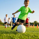 Kids' base layer top in vibrant colours for ages 5-10, ideal for sports