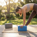 Yoga block made from EVA foam, available in blue and grey