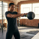 Cast iron kettlebell in various sizes and colours for gym workouts