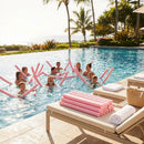 Colourful swimming pool noodles made from EVA foam