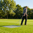 Steel drag mat on a sports field, showcasing its robust design for field maintenance