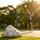 Netball carry bag with 12 netballs, mesh design for easy transport