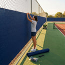 Green Tennis Court Windbreaks on an outdoor tennis court