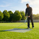 Steel drag mat on a sports field, showcasing its robust design for field maintenance